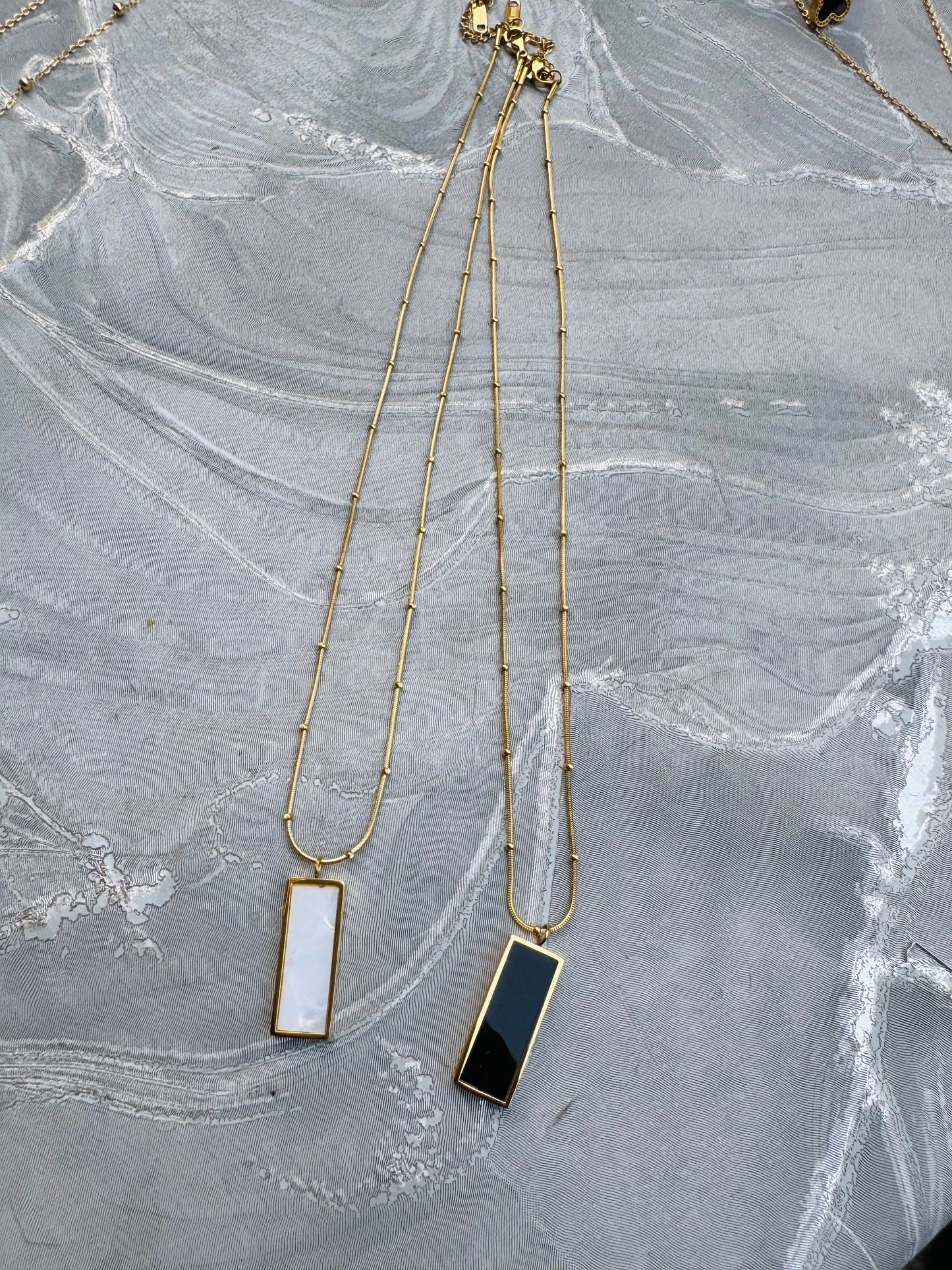 "Elegance Reversed" β White & Black Double-Sided Marble Pendant Necklace