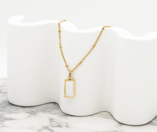 "Elegance Reversed" – White & Black Double-Sided Marble Pendant Necklace